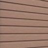 Détail de la texture imitation panneau bois d'une clôture en béton