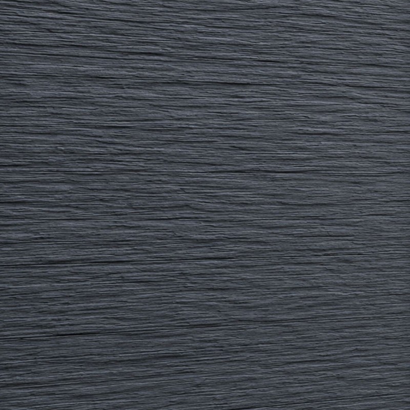 Détail de la texture imitation pierre ardoise d'une clôture en béton